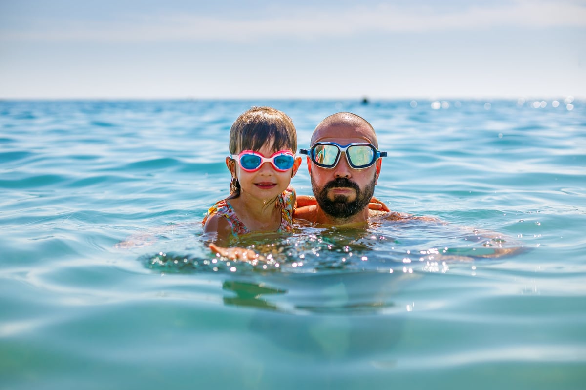 Father and daughter at the beach